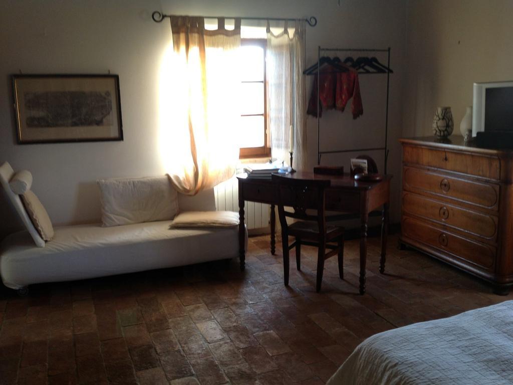 Poggioba Acomodação com café da manhã Sovana Quarto foto